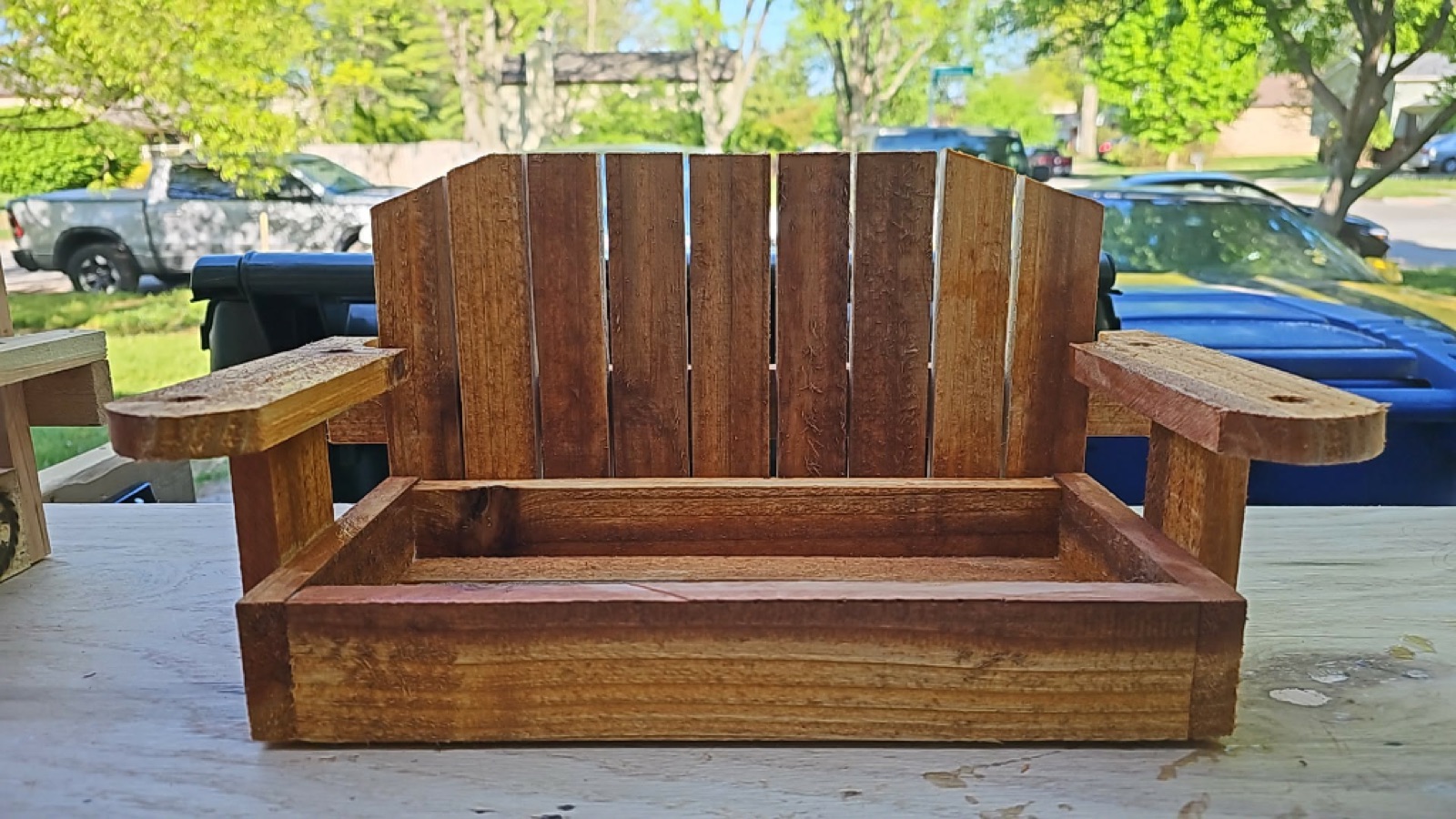 Miniature Adirondack-style display bench