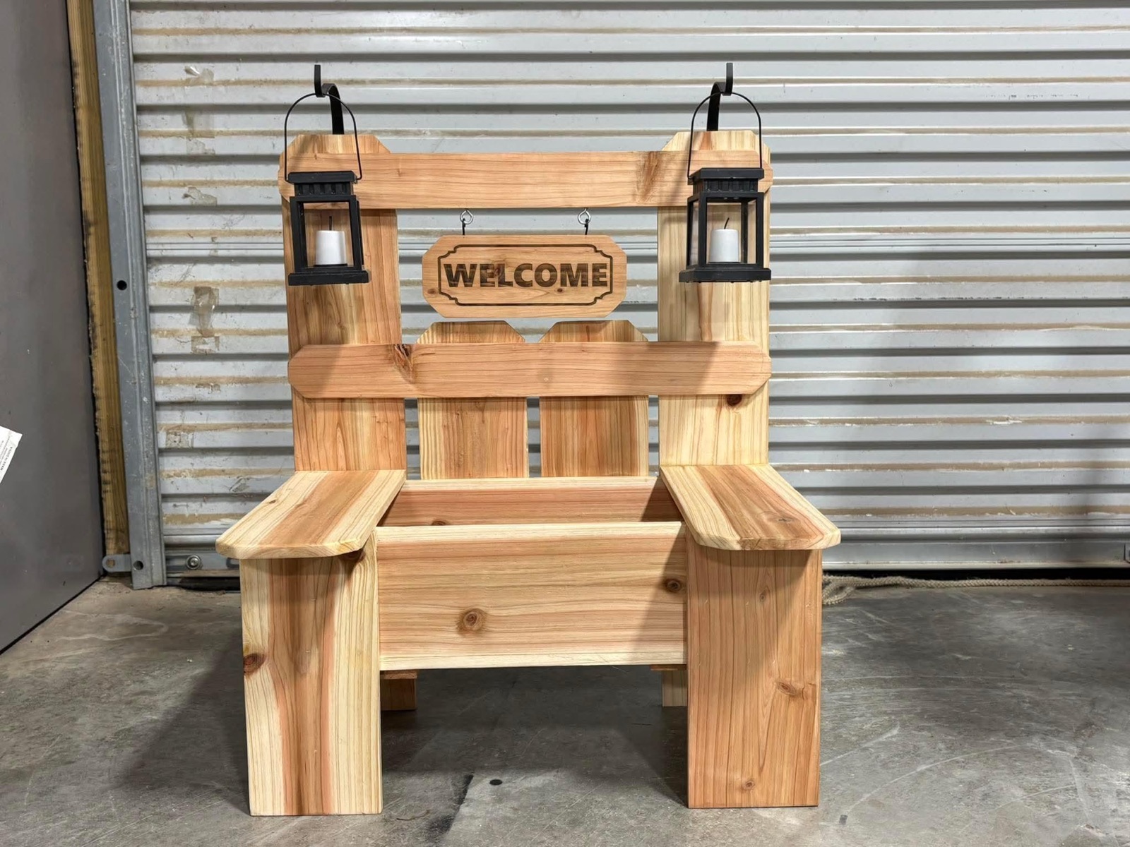 Cedar welcome bench with lantern posts
